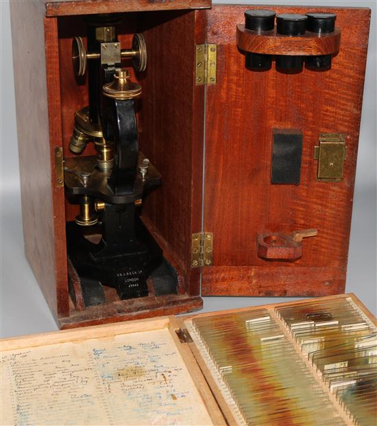 Microscope by R & J Beck, London, 29942, in case with three eyepieces, 2 boxes veterinary slides & vets pig ear tag pliers